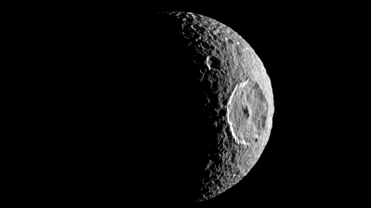 The Cassini spacecraft camera captured this image of Saturn's moon Mimas on October 16, 2010, showing the large Herschel crater.