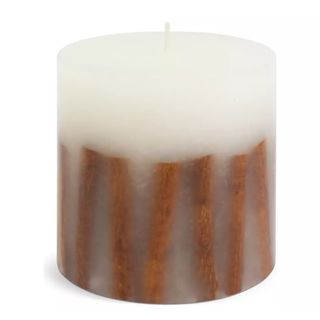 A fir and cinnamon candle for Christmas
