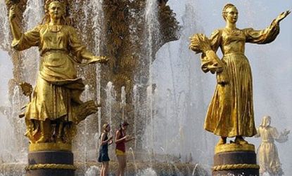 The residents of Moscow find relief from the sweltering heat in city fountains.