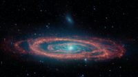 an orange red swirl of gas surrounds the bright shining blue white center of a galaxy in space