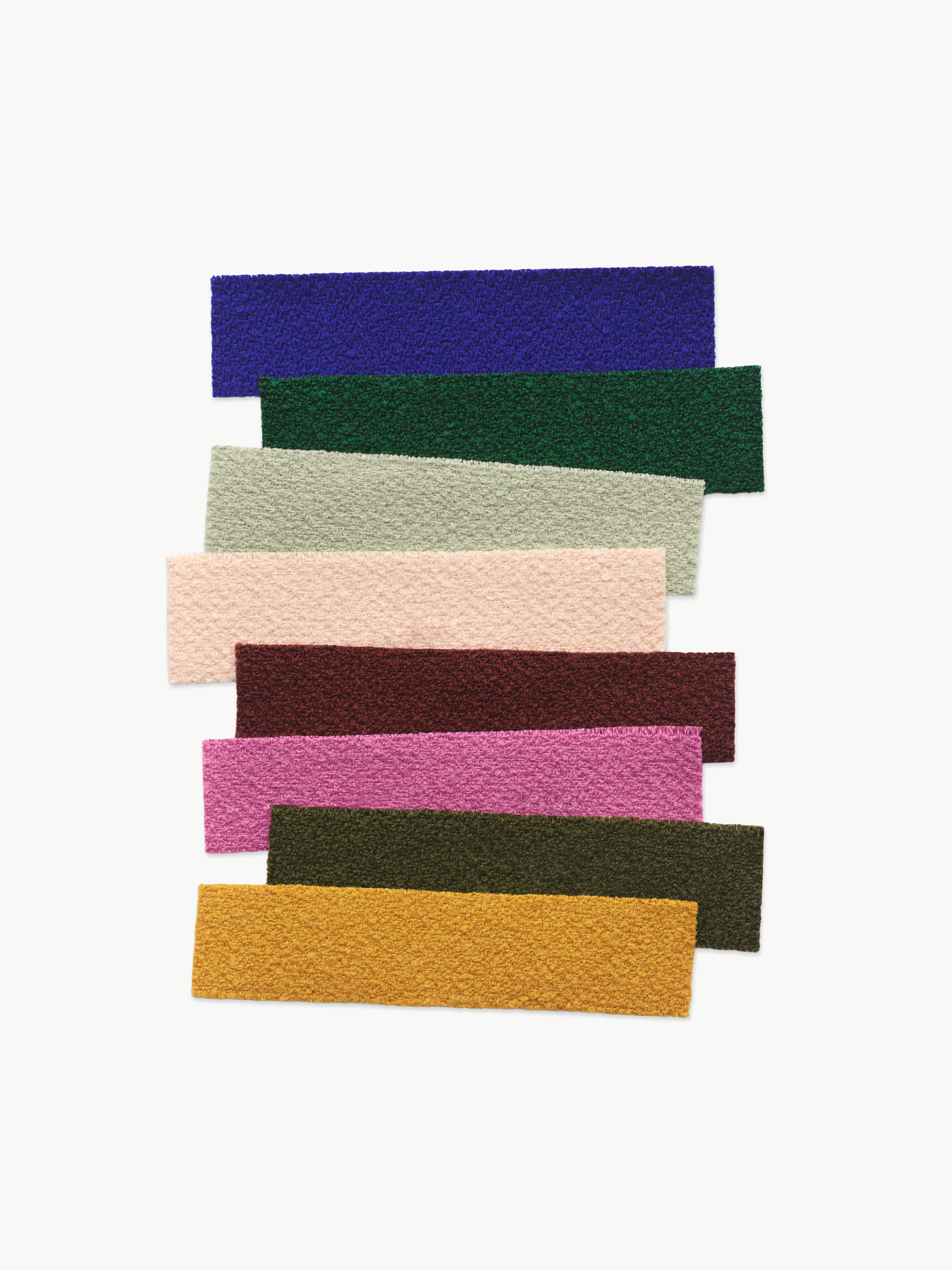 Colourful strips of Saxion fabric by Raf Simons and Kvadrat in colours including yellow, pink, gren and blue