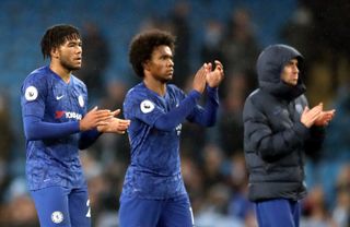 Chelsea’s Reece James (left) and Willian applaud fans at the end of the game