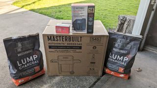 the delivery of the AutoIgnite™ Series 545 Digital Charcoal Grill and Smoker