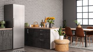 Where should a refrigerator go in the kitchen