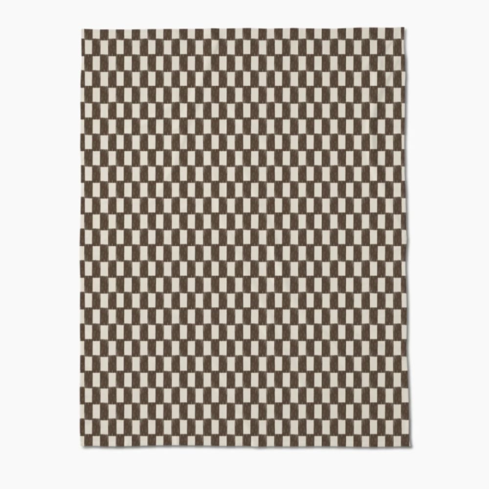 brown and white checked blanket