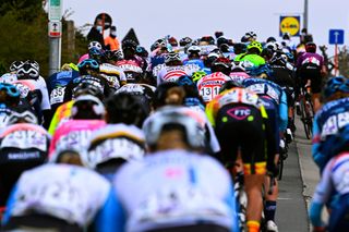 OUDENAARDE BELGIUM APRIL 04 The Peloton passing through Berendries sector during the 18th Ronde van Vlaanderen Tour of Flanders 2021 Womens Elite a 1524km race from Oudenaarde to Oudenaarde RVV21 rondevanvlaanderen tourofflanders UCIWWT on April 04 2021 in Oudenaarde Belgium Photo by Gregory van Gansen PoolGetty Images