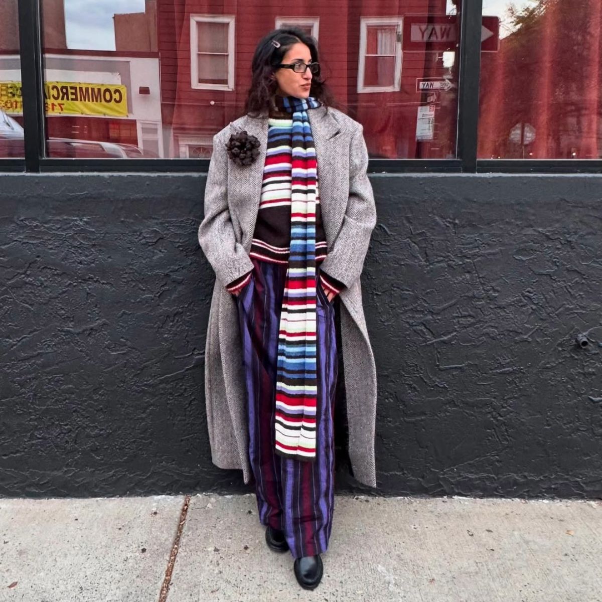 Anaa Saber in a striped sweater