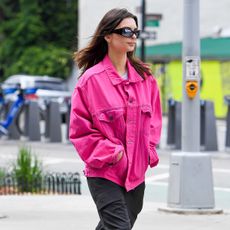 Emily Ratajkowski wearing a pink jacket in NYC