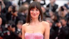 picture of Dakota Johnson at the Highest 2 Lowest red carpet at the 78th annual Cannes Film Festival