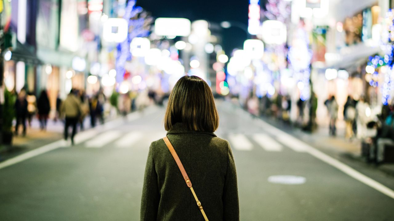 woman with bob haircut at city scene