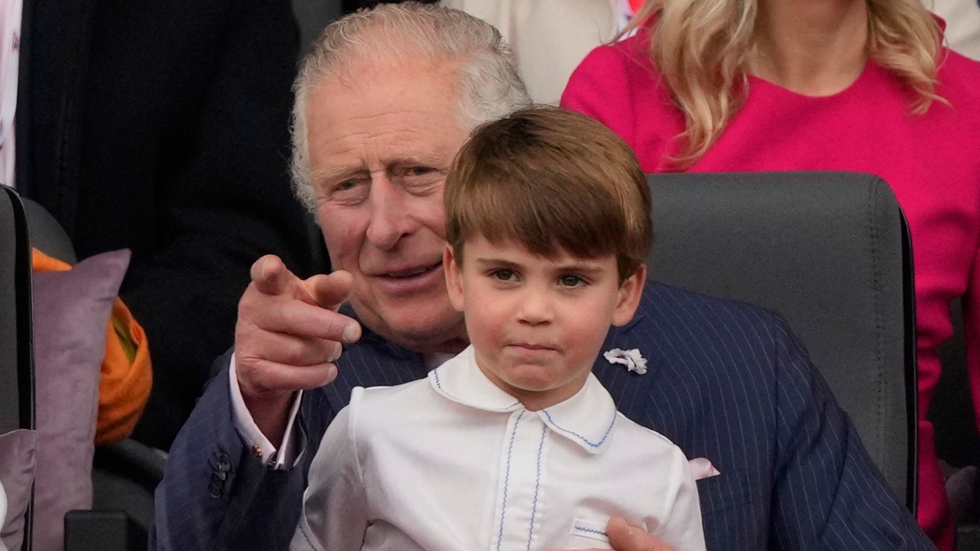King Charles with Prince Louis sat on his knee
