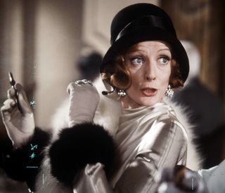 Maggie Smith is startled in a scene from the film 'Travels With My Aunt', 1972.