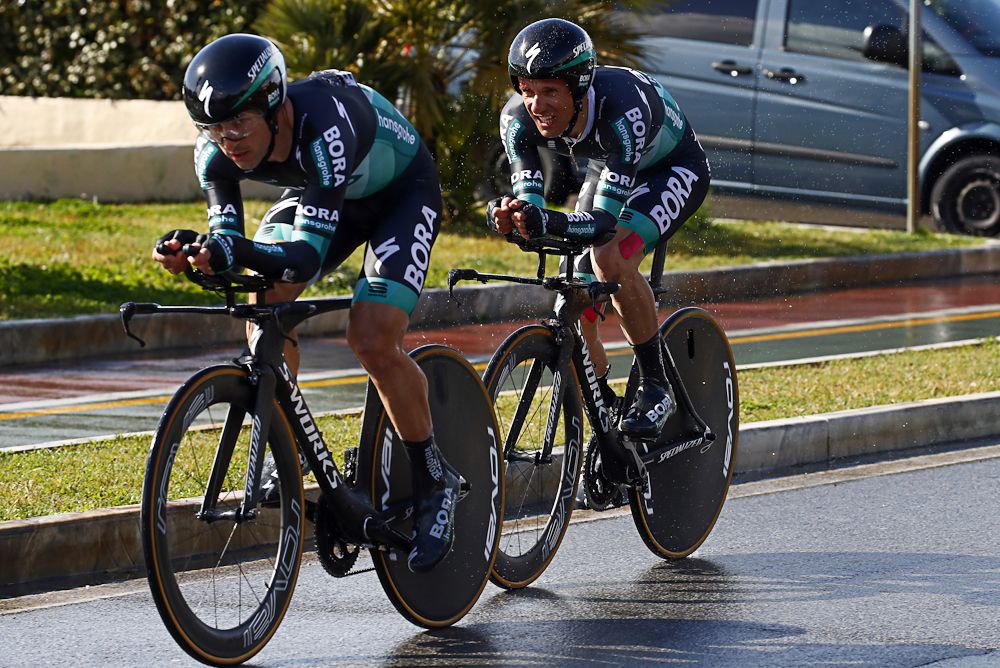 Oscar Gatto and Rafal Majka ride to the finish of the Tirreno-Adriatico team time trial after crashing with a spectator