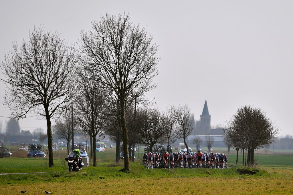 DE PANNE BELGIUM MARCH 24 A general view of the peloton passing through a landscape during the 5th Exterioo Womens Classic BruggeDe Panne 2022 a 1628km one day race from Brugge to De Panne Exteriooclassic UCIWWT on March 24 2022 in De Panne Belgium Photo by Luc ClaessenGetty Images