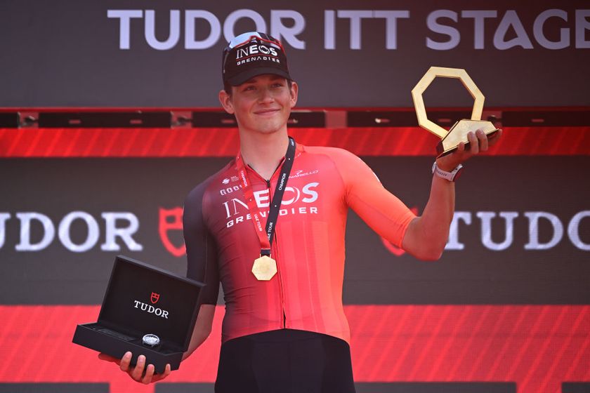 Josh Tarling on the podium after winning the time trial at the UAE Tour