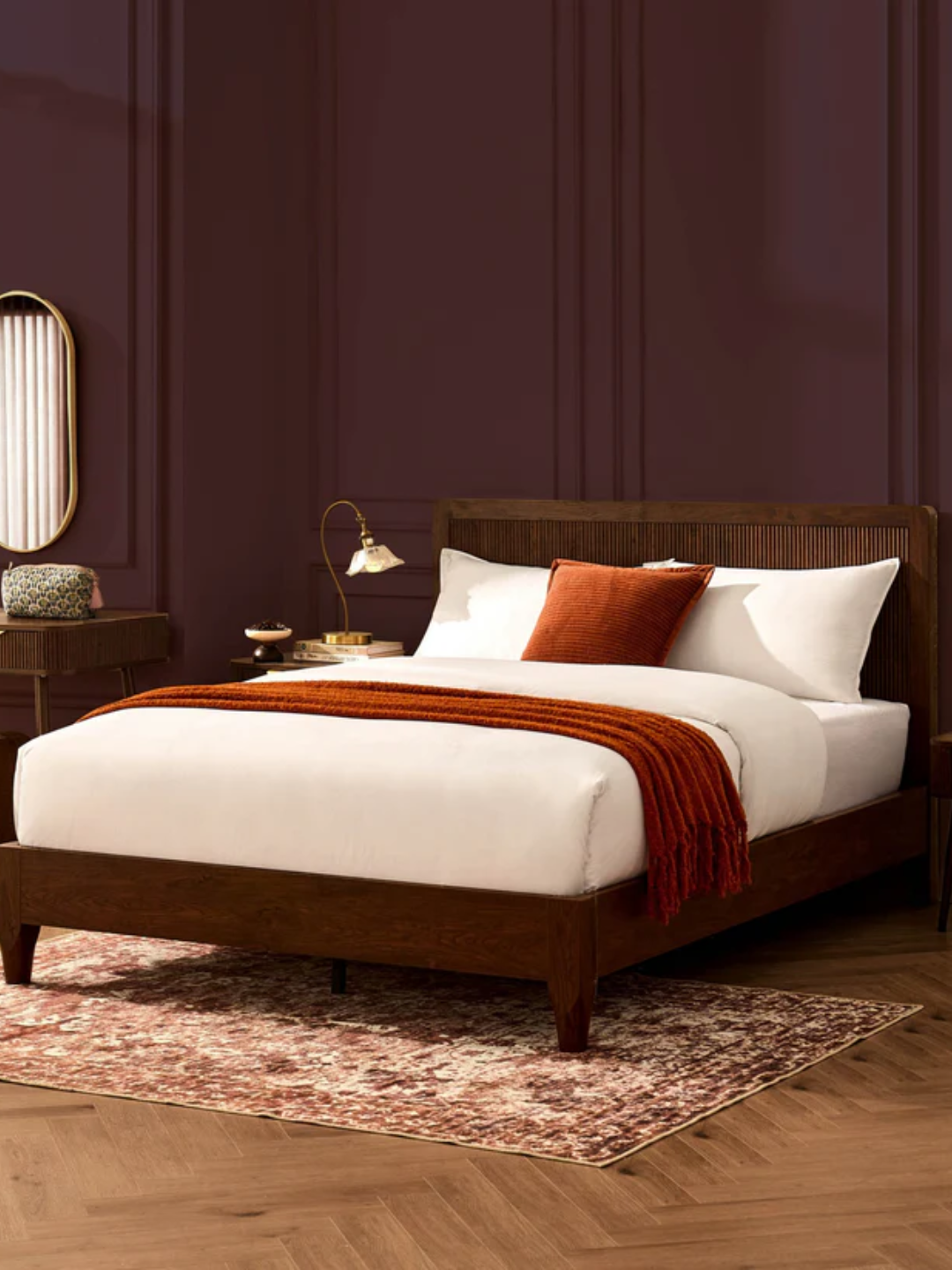 A wooden bed frame from DUSK