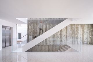 Venice Beach house by Dan Brunn, showing exposed concrete staircase