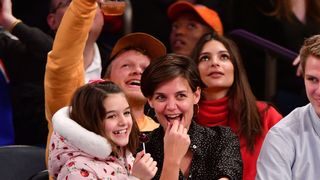 new york, ny december 16 suri cruise and katie holmes attend the oklahoma city thunder vs new york knicks game at madison square garden on december 16, 2017 in new york city photo by james devaneygetty images