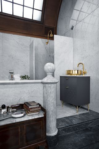 Ikea bathroom hacks small grey vanity with brass sink by Superfront
