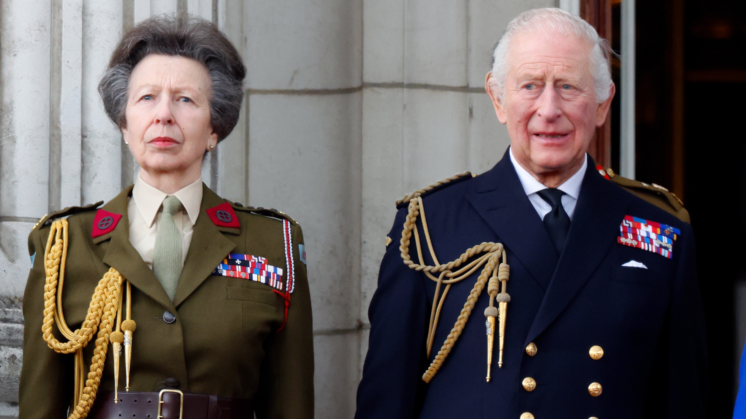 Princess Anne and King Charles III watch a flypast from the balcony of Buckingham Palace to mark the 80th anniversary of VE Day on May 5, 2025