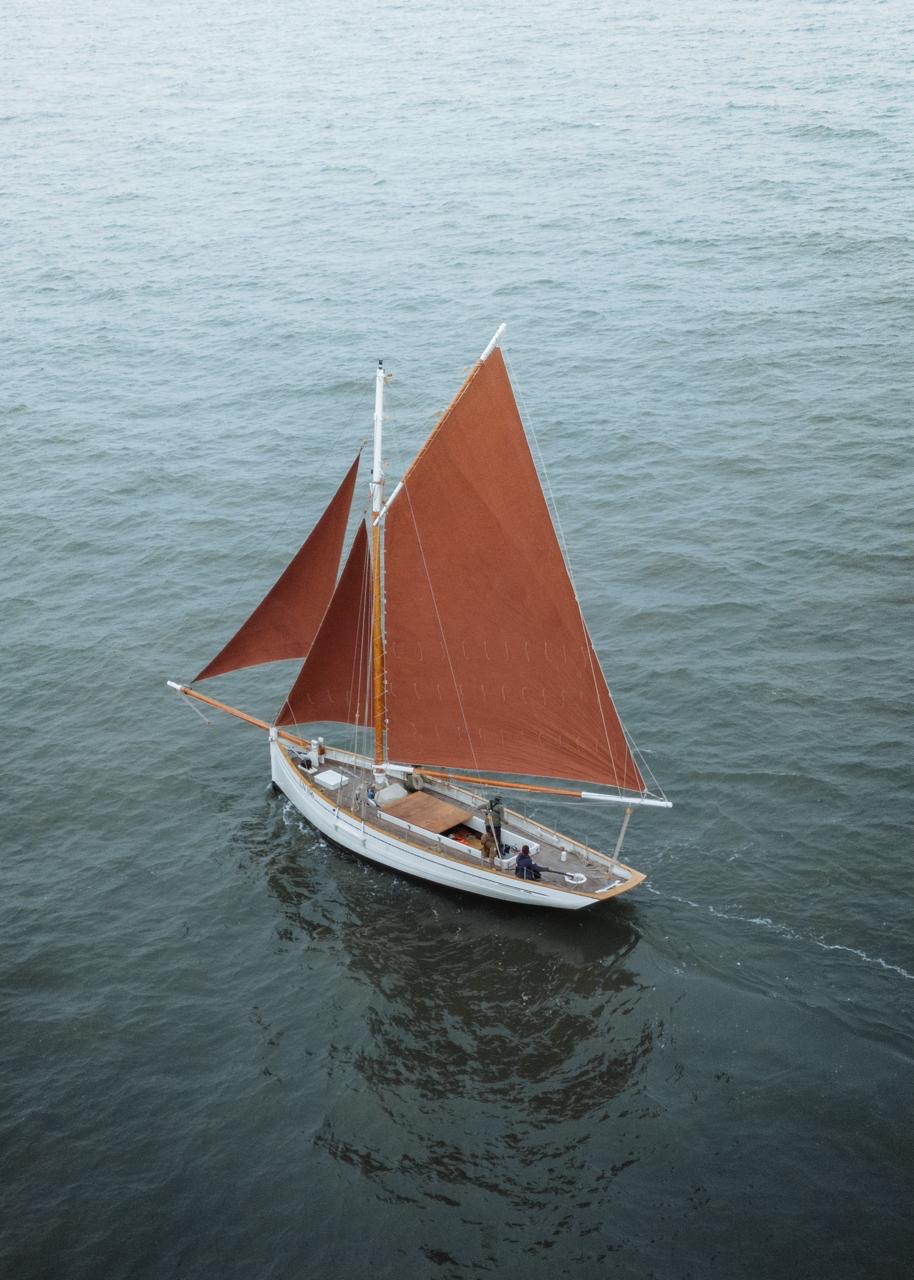 Norfolk smack with red sails