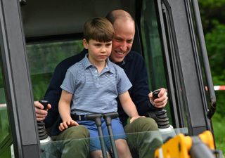 Prince William and Prince Louis sat inside a digger