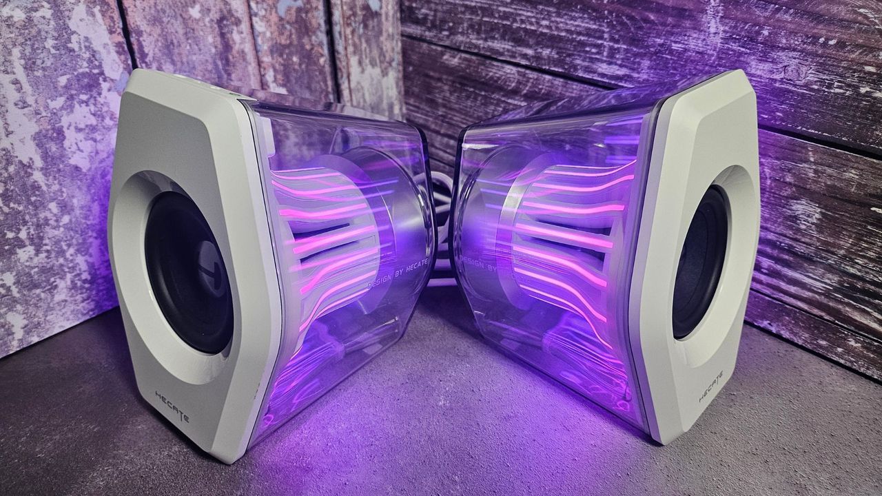 The Edifier G2000 Pro speakers with purple lighting