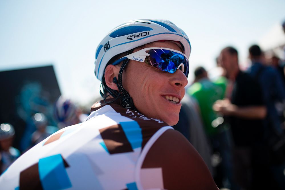 Romain Bardet smiles as he waits for start of the first stage of the 97th Volta Catalunya