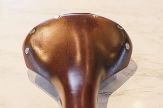 A leather bicycle saddle