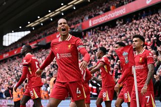 Virgil van Dijk of Liverpool celebrates scoring his team's second goal during the Premier League match between Liverpool FC and West Ham United FC at Anfield on April 13, 2025 in Liverpool, England.