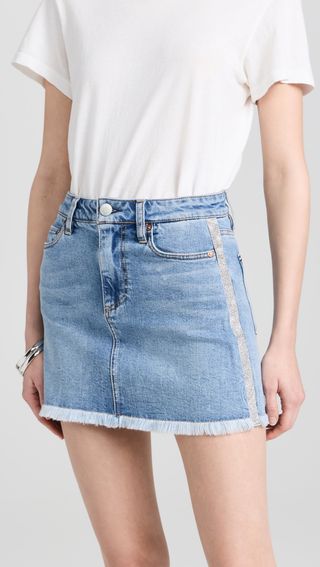 A Model Wears a Low Rise Mini Crystal Stripe Skirt