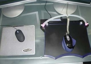 A comparison of the Headshot Controller and Aura mouse pad (right) next to your average mouse and mouse pad.
