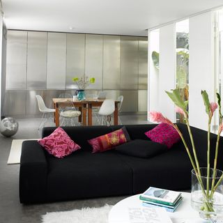 living room with sofa and dining table