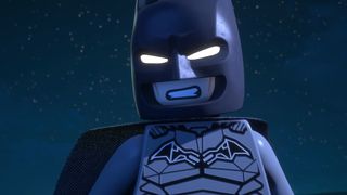 Lego Batman grimaces in the dark night