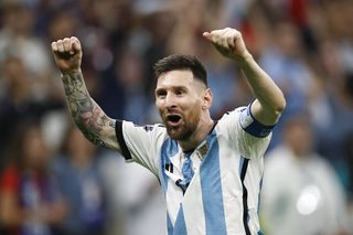 Lionel Messi celebrates after scoring for Argentina in the 2022 World Cup final against France.