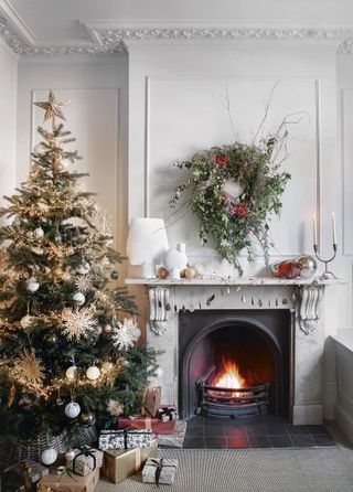 indoor Christmas wreath over a fireplace