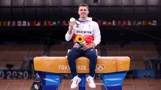Team GB’s Max Whitlock poses with his gold medal