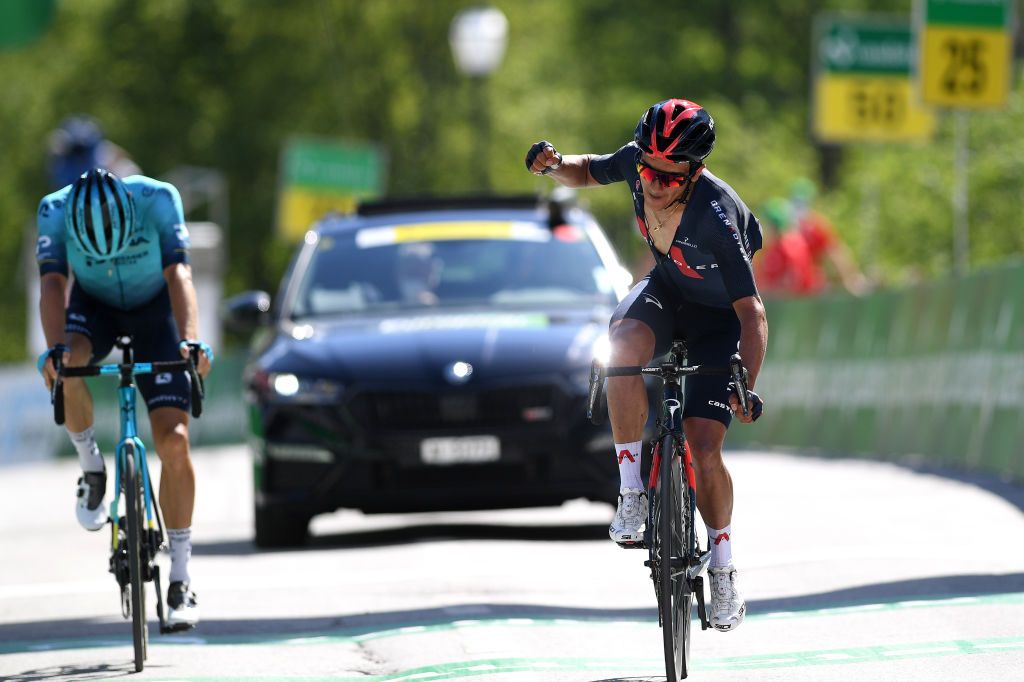 LEUKERBAD SWITZERLAND JUNE 10 Richard Carapaz of Ecuador and Team INEOS Grenadiers celebrates at arrival ahead of Jakob Fuglsang of Denmark and Team Astana Premier Tech during the 84th Tour de Suisse 2021 Stage 5 a 1752km stage from Gstaad to Leukerbad 1385m UCIworldtour tds tourdesuisse on June 10 2021 in Leukerbad Switzerland Photo by Tim de WaeleGetty Images