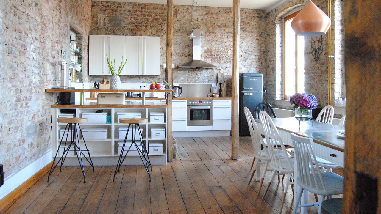 industrial style kitchen with hairpin leg barstools