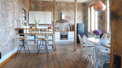 Industrial style kitchen in an exposed brick space from Cult Furniture