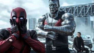 Deadpool gasps at the camera as Colossus watches on in 2018's Deadpool movie