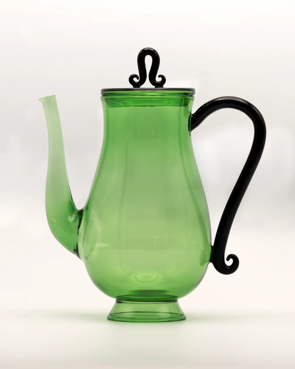 Green glass tea or coffee pot