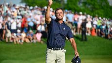 Bryson DeChambeau fist pumps while walking off the 18th green during the final round of PGA Championship at Valhalla Golf Club on May 19, 2024