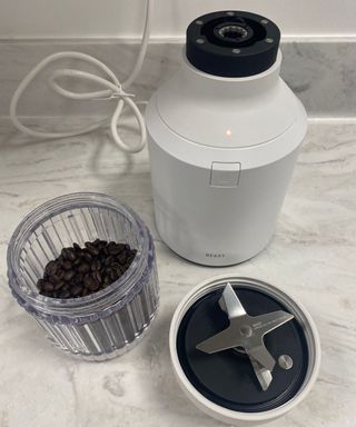 Grinding coffee beans in the Beast Health B10 Blender