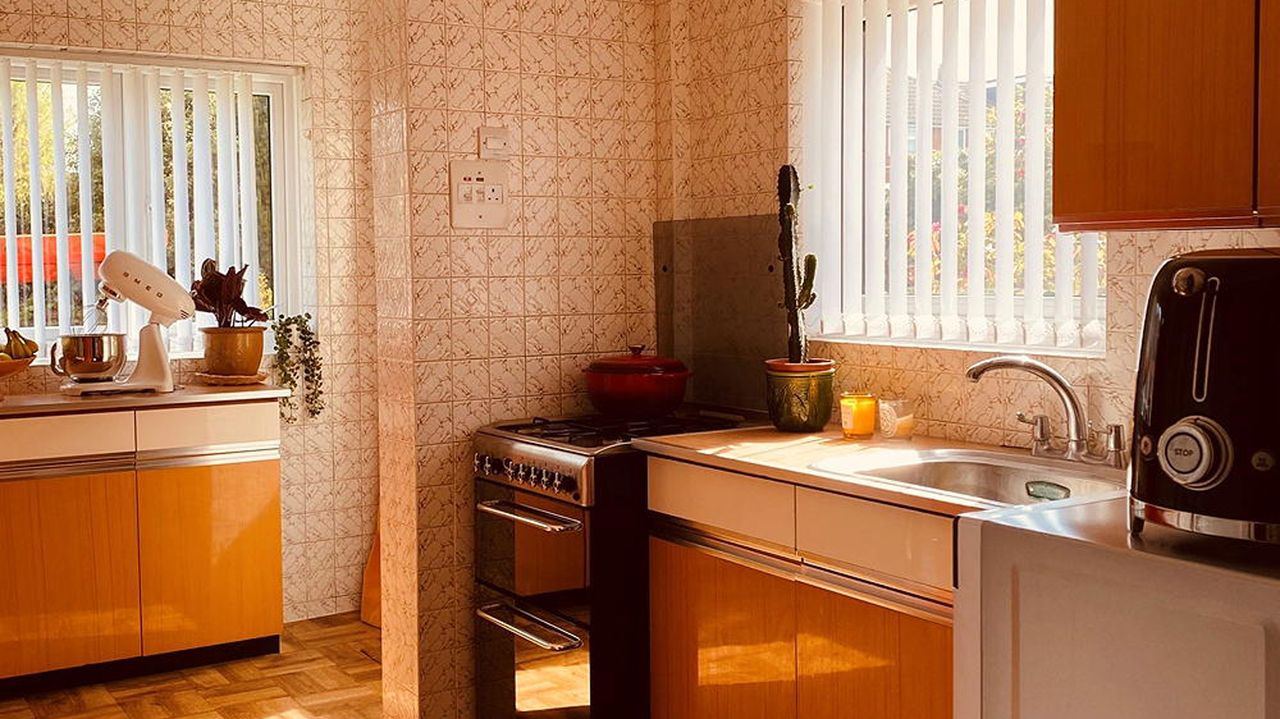 seventies style kitchen with wooden cabinets