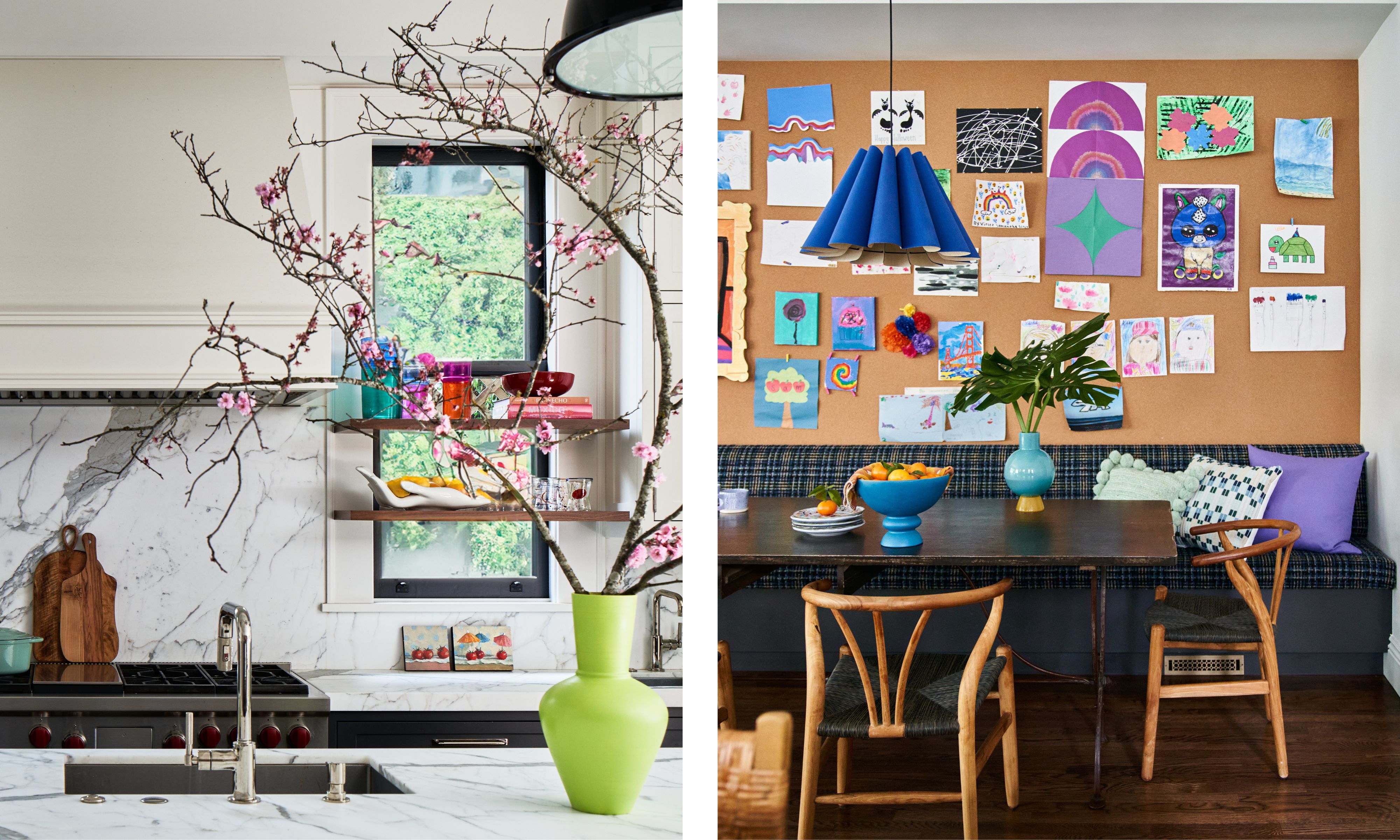 san francisco kitchen with white kitchen cabinetry and a dark grey island with a banquette seat with mid century chairs and a large cork board with family drawings and notes