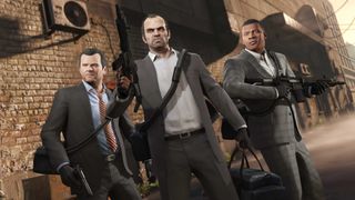 Three playable characters stand in a triangle wearing suits and holding guns in GTA 5