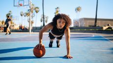 Doing a HIIT workout with a basketball