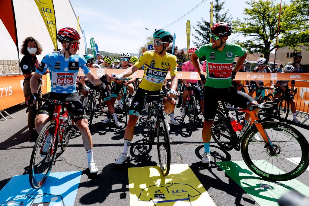 SAINT HAON LE VIEUXON FRANCE JUNE 01 Matthew Holmes of United Kingdom and Team Lotto Soudal Polka Dot Mountain Jersey Lukas Pstlberger of Austria and Team Bora Hansgrohe yellow leader jersey Sonny Colbrelli of Italy and Team Bahrain Victorious Green Points Jersey during the 73rd Critrium du Dauphin 2021 Stage 3 a 1722km stage from Langeac to Saint Haon Le Vieuxon UCIworldtour Dauphin dauphine June 01 2021 in Saint Haon Le Vieuxon France Photo by Bas CzerwinskiGetty Images