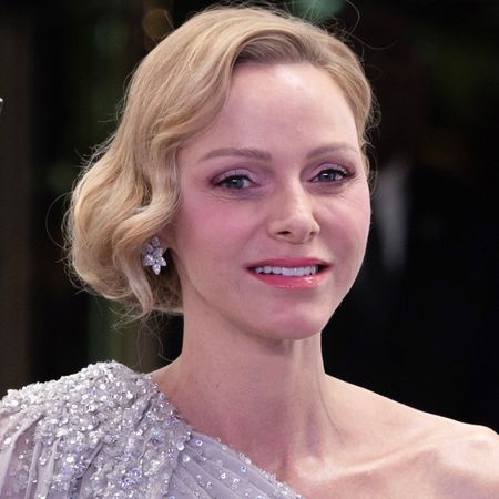 Princess Charlene of Monaco attends the Rose Ball 2026 Photocall on March 21, 2026 wearing a glittering sequin caped gown from Elie Saab